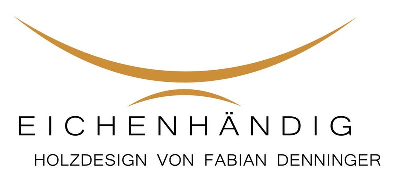 May include: A logo featuring a gold-colored curved graphic element above the text EICHENH&Auml;NDIG in a black sans-serif font, with the additional text HOLZDESIGN VON FABIAN DENNINGER positioned below in a smaller black sans-serif typeface.
