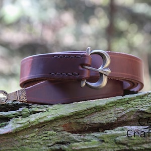 Narrow gothic belt with strap end