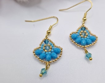 handmade Miyuki bead earrings - orange blue pendants