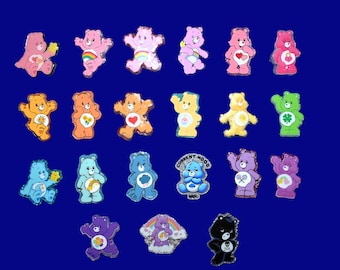 Care Bear badge reels. Available in multiple colors, and signs.