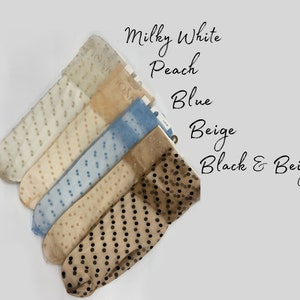May include: Five pairs of sheer polka dot socks in different colors: milky white, peach, blue, beige, and black and beige.
