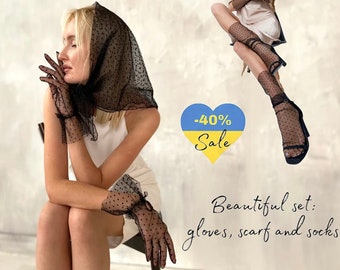 May include: A black polka dot scarf, gloves, and socks set. The gloves have ruffled cuffs. The socks are worn with black open-toe heels. The text on the image says "Beautiful set: gloves, scarf and socks". A heart-shaped graphic with the text "-40% Sale" is also present.
