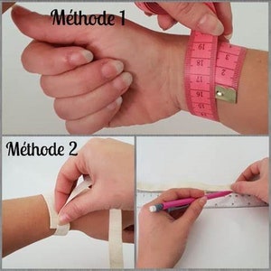 May include: Two methods for measuring your wrist for a bracelet. The first method shows a pink measuring tape wrapped around a wrist. The second method shows a white fabric strip wrapped around a wrist and a pencil marking the fabric.