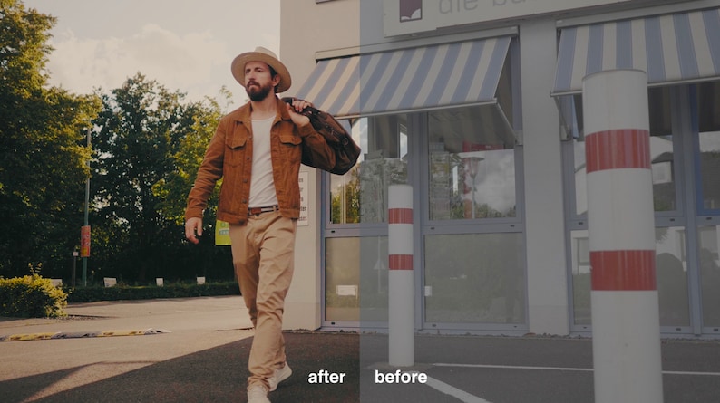 May include: A man wearing a brown jacket, a white t-shirt, beige pants, and a white hat walks away from a building with a striped awning. He is carrying a brown bag over his shoulder.