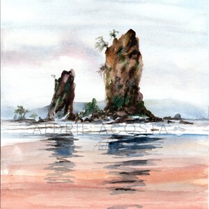 May include: Watercolor painting of a coastal scene featuring two large, dark rock formations rising from the water. The water reflects the sky and the rocks, with a sandy beach in the foreground. The artist's signature is visible.
