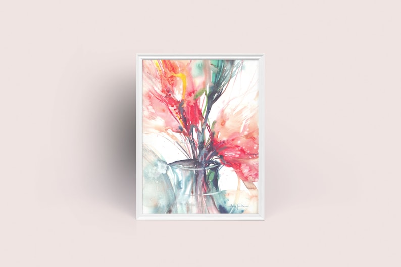 May include: Watercolour painting of vivid red and pink flowers in a clear glass vase, set against a white background. The artwork is framed in a white rectangular frame, creating a striking contrast. The painting has a soft, airy feel.