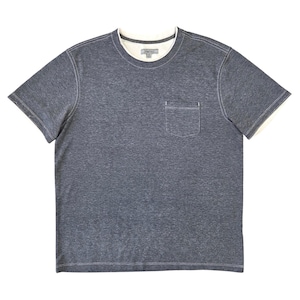 May include: A white ceramic mug with a black handle and the text "But First, Coffee" in a black, handwritten-style font. The mug is on a white surface.