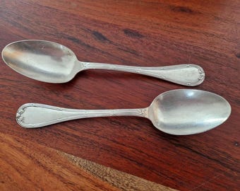 Christofle - Série de 2 cuillères à moka modèle Rubans croisés - en métal argenté - France