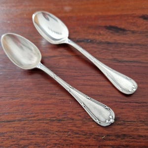 Christofle - Set of 2 mocha spoons, Rubans croisés model - in silver-plated metal