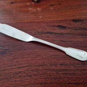 Alfenide, Christofle - Chinon model fish knife in silver-plated metal