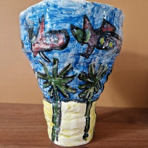 Jaber Al Mahjoub - Ceramic vase with palm trees and airplanes decoration by Naif