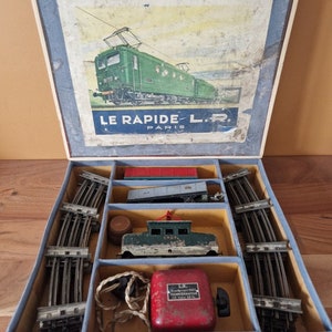 Old Louis Roussy box set - L.R Le Rapide - Scale O - Including a locomotive called a salt box, 2 gondola wagons, a transformer