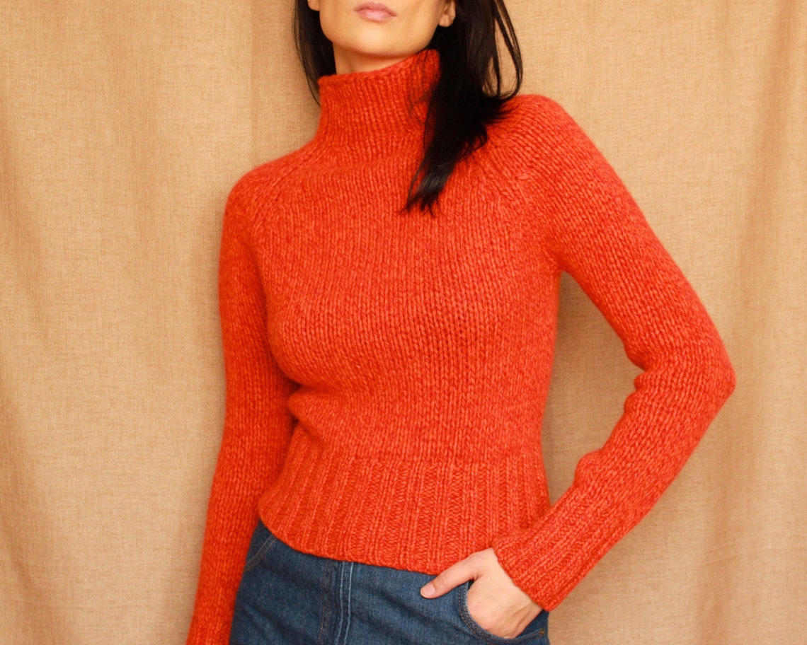 orange turtleneck women's