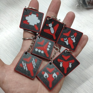 Eagle Stratagem Keychains with Activation Codes on the back