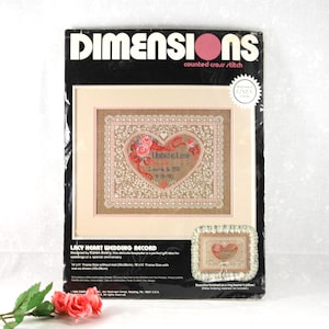 May include: A set of three ceramic mugs with a speckled, matte finish. The mugs are in shades of cream, light gray, and dark gray. Each mug has a simple, minimalist design, perfect for coffee or tea.