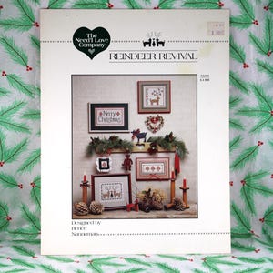 Vintage 1984 Need'l Love Co. „Reindeer Revival” autorstwa Renee Nanneman, Ulotka do haftu krzyżykowego nr L1-RR, 5 wzorów/projektów z reniferami i drzewami
