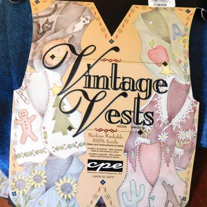 May include: A package for a vintage vest craft kit. The package features a colorful illustration of four different vest designs. The text on the package reads "Vintage Vests" and "Machine Washable 100% Acrylic".