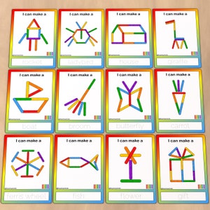May include: A set of 12 colorful cards with images of different objects that can be made with sticks. Each card has the text "I can make a" followed by the name of the object, such as "rocket", "ladybird", "house", "giraffe", "boat", "broom", "butterfly", "carrot", "ferris wheel", "fish", "flower", and "gift".