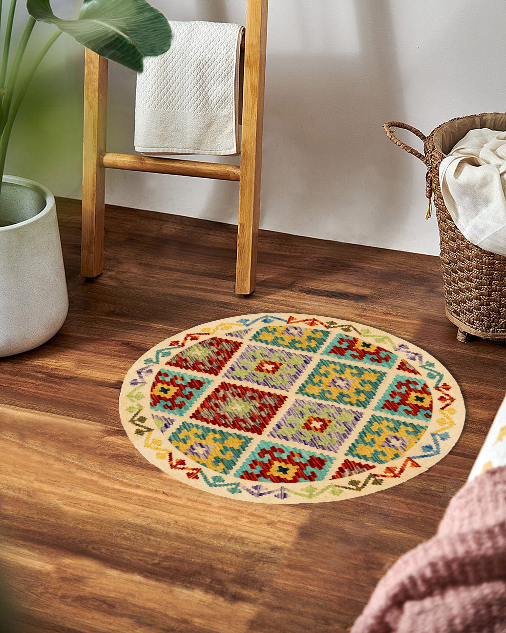 手織りウールラウンドラグ：幾何学模様のマルチカラーカーペット