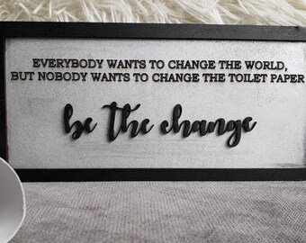 Funny Bathroom Sign: "Be The Change" Toilet Paper Decor