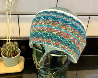 Knitted headband with merino lining.