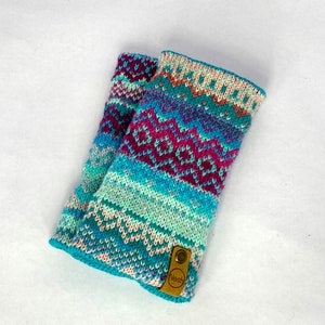 Turquoise, pink and fuchsia wrist warmers with merino lining