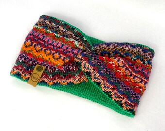 Knitted orange, green and purple fair isle headband.