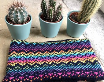 Knitted rainbow and navy fair isle headband.