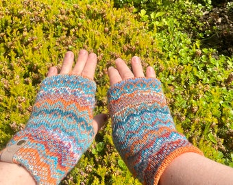 Turquoise, orange and cream wrist warmers with merino lining