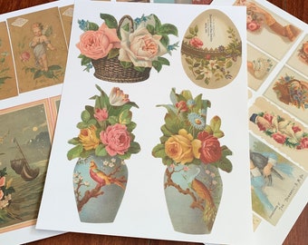 May include: A sheet of vintage style paper ephemera featuring images of flowers, birds, and angels. The paper is white with a light brown border. The images are in a variety of colours, including pink, blue, yellow, and green.