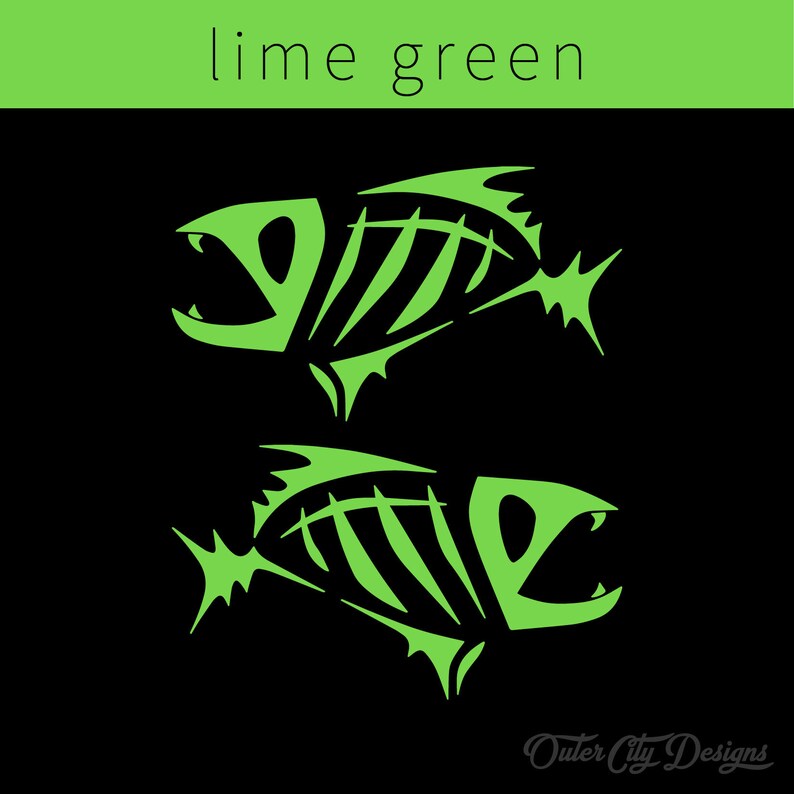 May include: Two lime green fish skeletons on a black background. The fish are facing opposite directions and have a stylized design. The text "Outer City Designs" is at the bottom of the image.