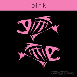May include: Two pink fish skeletons with a black background. The text "pink" is at the top of the image. The text "Outer City Designs" is at the bottom of the image.