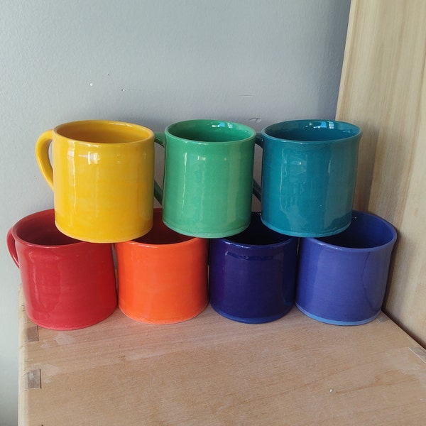 Colorful solid-color mugs in various shades hand-thrown hand painted stoneware pottery