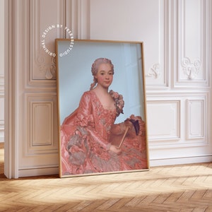 May include: A framed portrait of a woman in a pink and white dress, holding a fan. The portrait is set against a pale blue background.