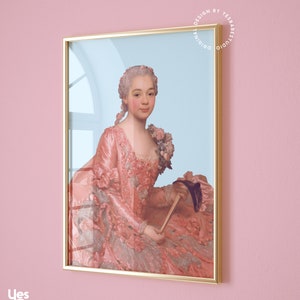 May include: A framed portrait of a woman in a pink and white dress with a blue fan. The background is a light blue colour.