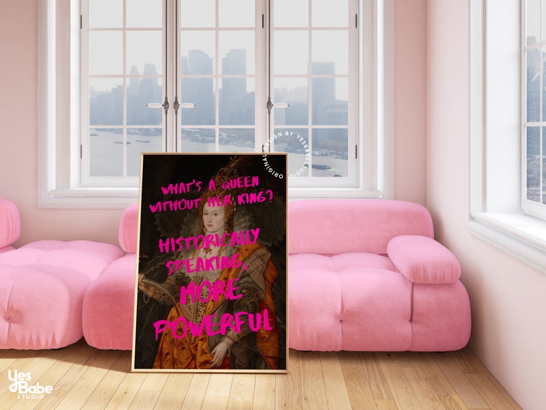 May include: A framed print of a painting of a queen with a pink text overlay that reads "What's a queen without her king? Historically speaking, more powerful."