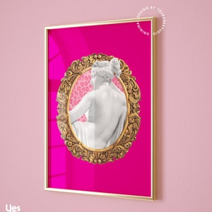 May include: A pink background with a gold ornate frame surrounding a white statue of a woman. The statue is facing away from the viewer and has a leopard print pattern behind it.