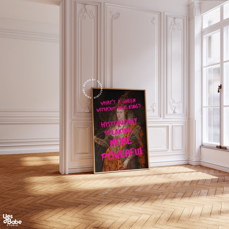 May include: A framed print of a painting of a queen with a pink text overlay that reads "What's a queen without her king? Historically speaking, more powerful."