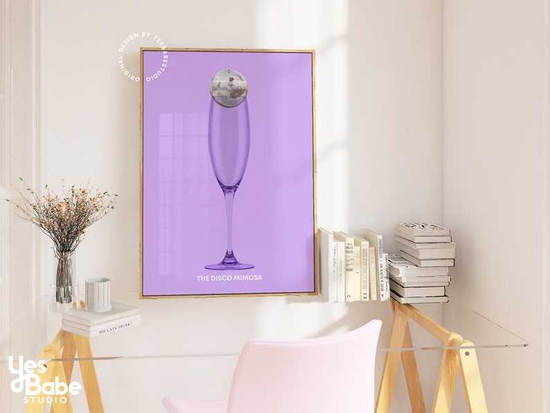 May include: A purple poster with a champagne flute filled with a disco ball. The text on the poster reads "The Disco Mimosa".
