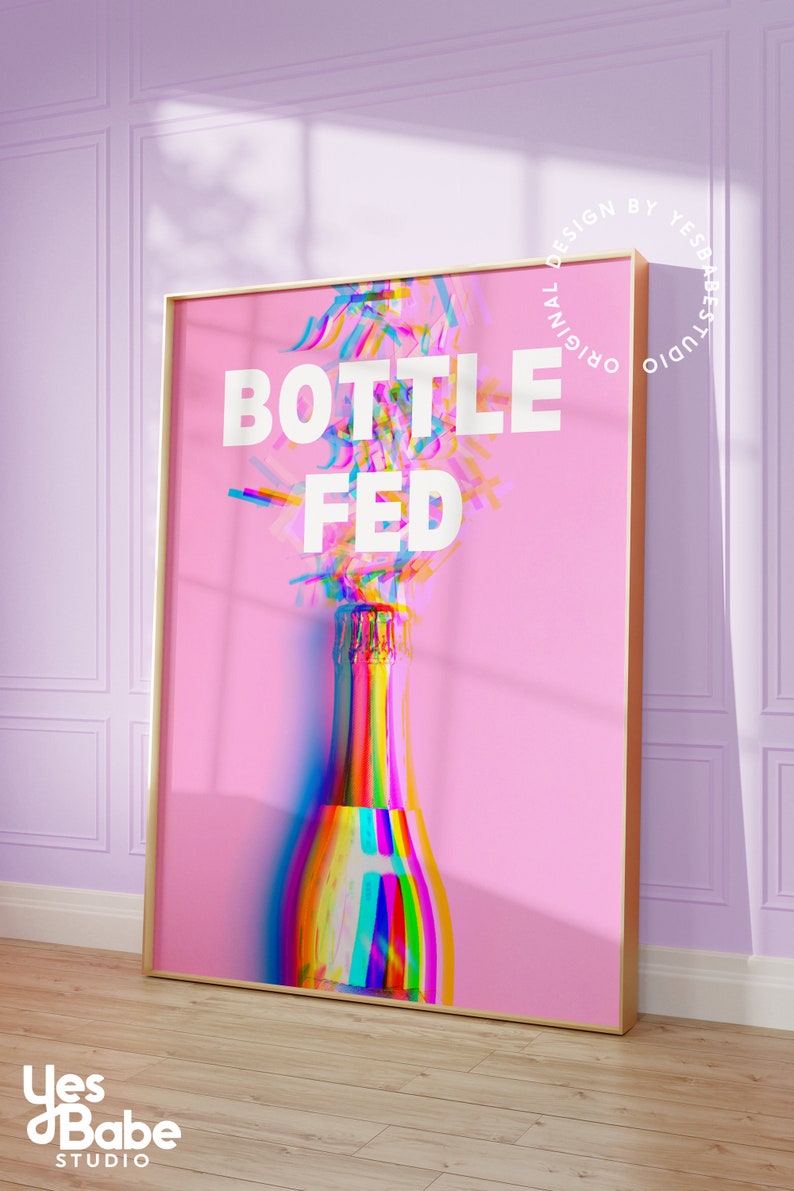 May include: A pink poster with the text "BOTTLE FED" in white letters. A rainbow-colored champagne bottle is in the center of the poster.