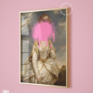 May include: A framed painting of a woman in a white dress with a pink spray paint splatter covering her face. The painting is set against a pink wall.