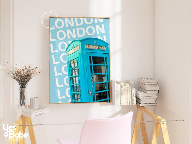 May include: A blue vintage telephone box with the word "TELEPHONE" printed on the side, against a light blue background with the word "LONDON" repeated in white.