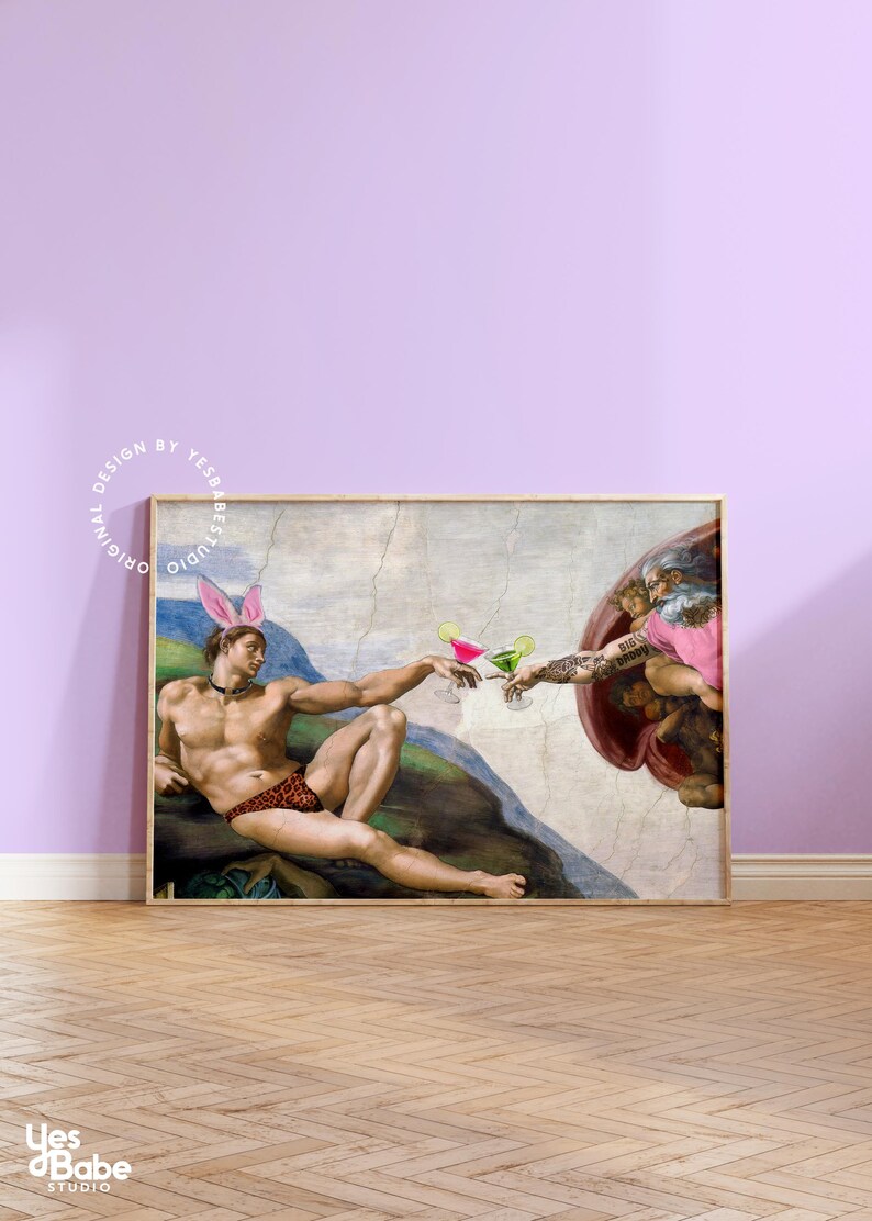 May include: A humorous parody of the famous "The Creation of Adam" painting, featuring two men in a similar pose, but holding cocktails instead of touching fingers. The man on the left is wearing a pink bunny ear headband and a leopard print swimsuit. The man on the right has a tattoo that says "Big Daddy" and is wearing a pink shirt. The painting is framed in a wooden frame.