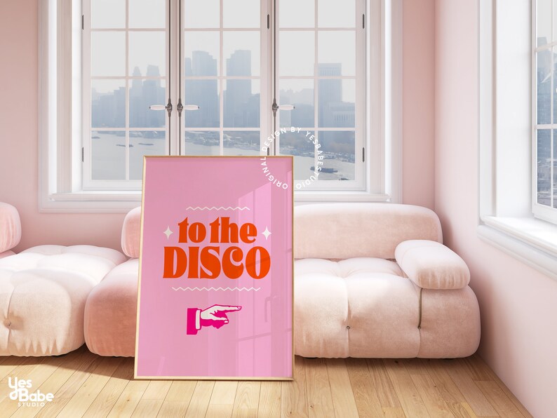May include: Pink and orange poster with the text "to the disco" and a pointing hand graphic.