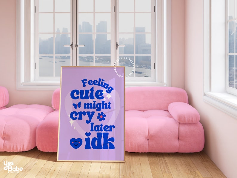 May include: A purple and blue poster with the text "Feeling cute might cry later idk" in a retro font. The poster features a heart with a butterfly and a flower.