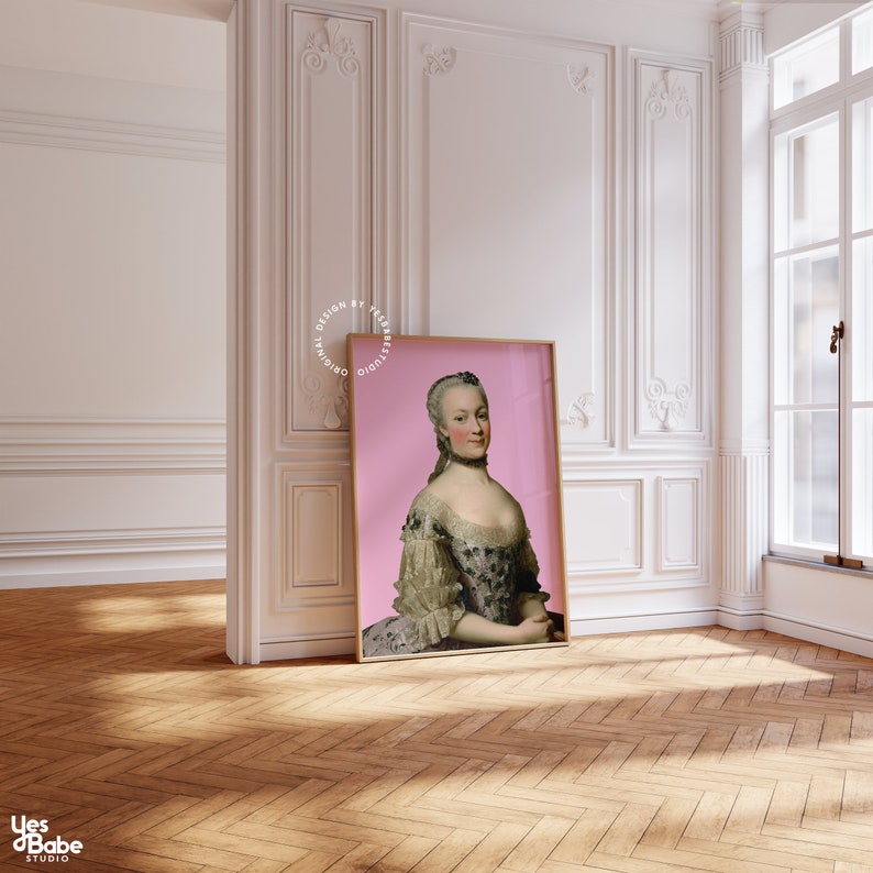 May include: A framed portrait of a woman in a white and black dress with a pink background. The woman is wearing a pearl necklace and has her hair pulled back.