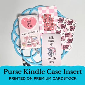 May include: A set of five pink and white cards with various designs and text. The cards feature phrases like "Hot Girls Read Smut", "Good Girl", "Most Ardently", "I'm a Kindle Girlie", "Tall, Dark, & Morally Grey". The cards are designed for use as a purse insert for a Kindle.