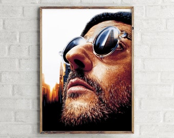 May include: A close-up of a man's face with a beard, wearing sunglasses. The sunglasses reflect a cityscape. The man is looking up and to the right.