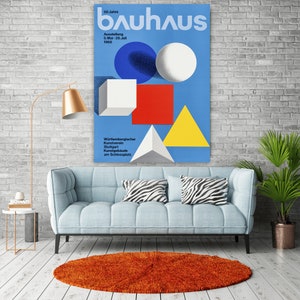 May include: A blue poster with the text "50 Jahre bauhaus" and the dates "5. Mai - 26. Juli 1968". The poster also features geometric shapes in red, yellow, blue, and white.