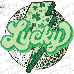 May include: A green and black graphic with a lightning bolt and the word "Lucky" in a retro font. The background is a green and black leopard print.